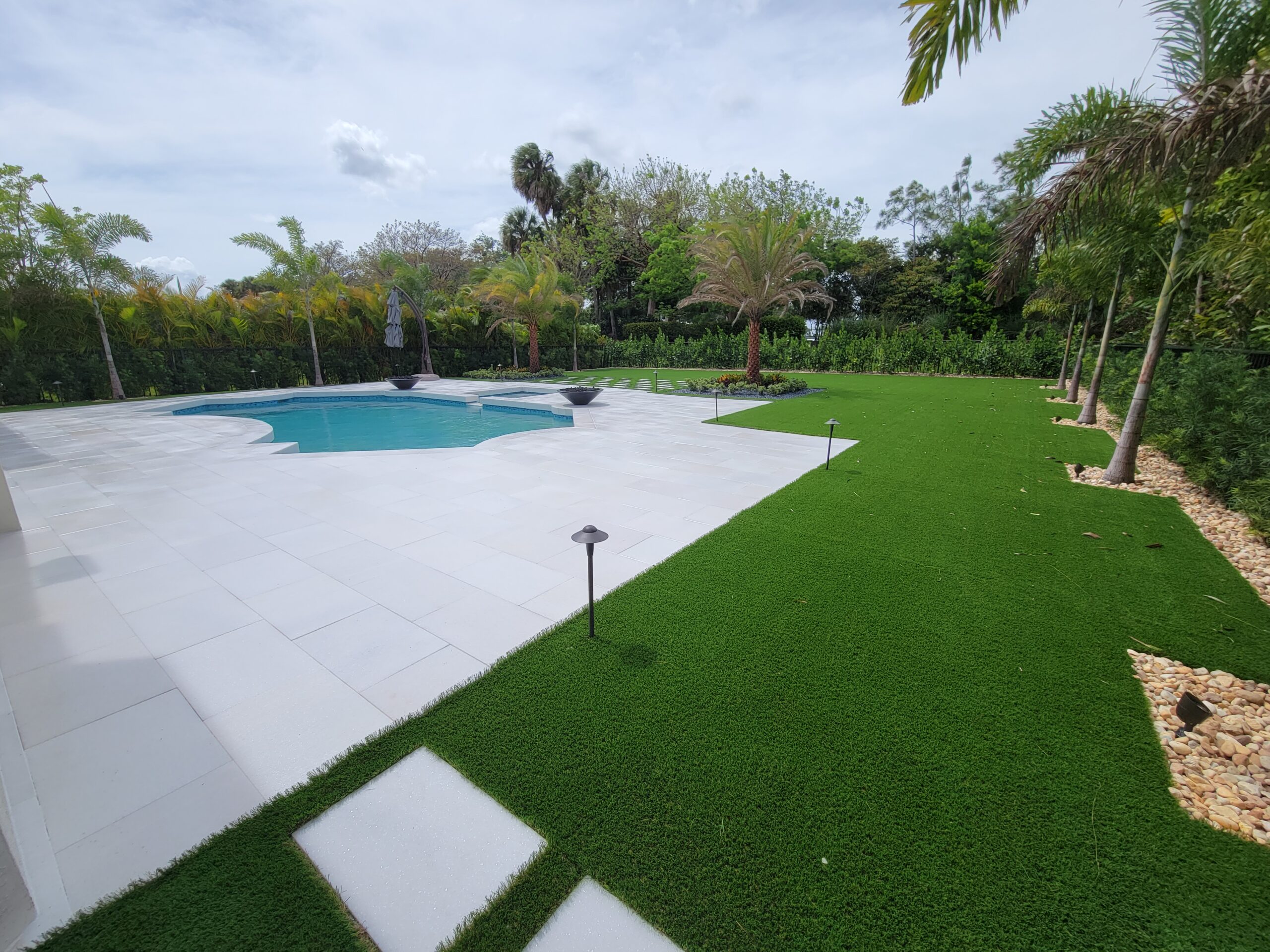 synthetic turf water features pool deck pavers walkways hardscaping landscape design