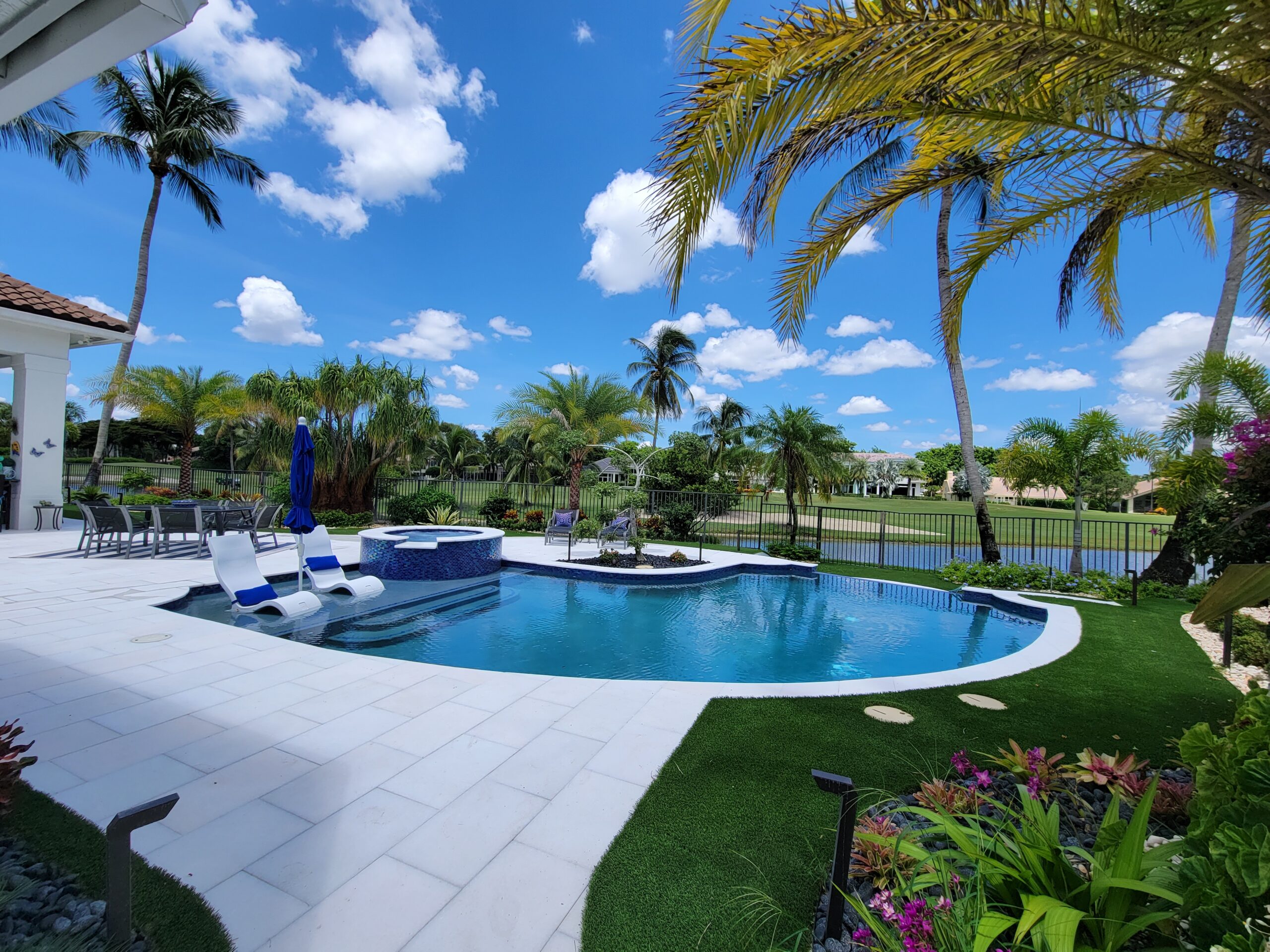pool deck water feature landscape design broward landscaping